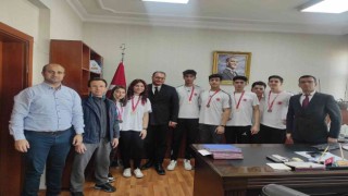 Kaymakam Arıkan şampiyon sporcuları ağırladı
