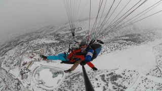 Ergan Dağında adrenalin dolu göl manzaralı yamaç paraşütü