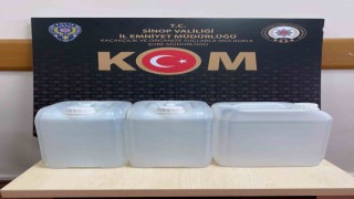 Motosikletin bagajından 15 litre kaçak alkol çıktı