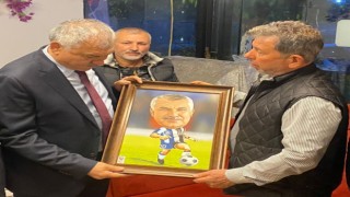 TSYDden başkan Karalara karikatür sürprizi