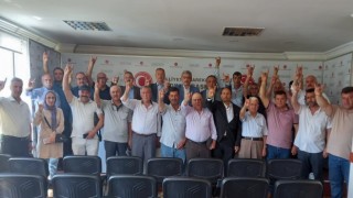 MHPye katılanlara rozetleri törenle takıldı
