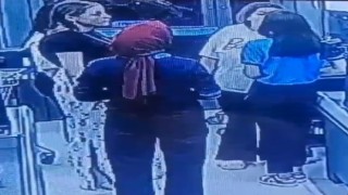 Esenlerde tartıştığı market çalışanı kadına yumruk atan müşteri kamerada