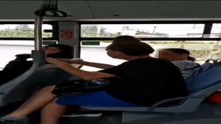 Tesettürlü kadına otobüste çirkin saldırı: Peçeni al git