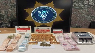 Torbacıların evinden yüklü miktarda para ve para sayma makinesi çıktı