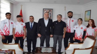 Dünya kupasına gidecek sporculardan Kaymakam Demire ziyaret