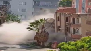 Meraklı vatandaşların bina çöktüğü esnada yaşadıkları panik kamerada
