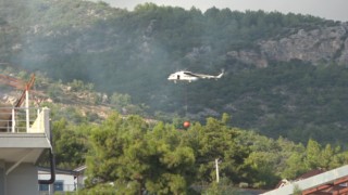 Alanyada ormanlık alanda çıkan yangın söndürüldü