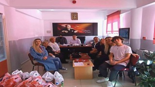 Kütahya Yardım Sevenler Şubesi 100 çocuğa mont ve bot dağıttı