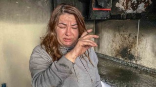 Evinin yandığını gören kadın kurye sinir krizi geçirdi