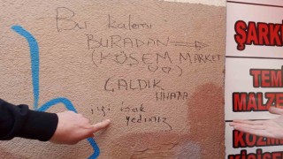 Kalem çaldıkları bakkalın duvarına yazdıkları yazıda suçlarını itiraf edip dalga geçtiler