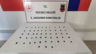Üzerinden 53 sikke çıktı