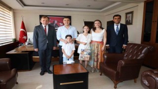Karacasu Kaymakamı Gündoğdu, genç yazar Nası ağırladı