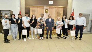 Şampiyon sporculardan Osman Ercana ziyaret