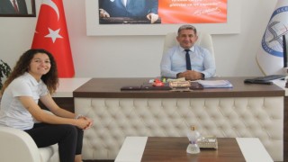 Menteşe İlçe Milli Eğitim Müdürü Kömürcü şampiyon sporcuyu ağırladı
