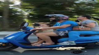 Sarıyerde motosikletlinin tehlikeli yolculuğu kamerada: Emzikli çocuğu ayakta taşıdı