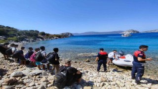 Bozburun Girneyit koyunda 13 düzensiz göçmen ve 2 göçmen kaçakçısı yakalandı