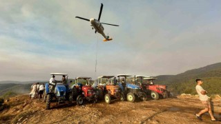 Köylüler yangına karşı seferber oldu: Tankerlerle helikopterlere su takviyesi yapılıyor