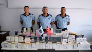 Kuşadasında insan sağlığını tehdit eden sahte parfümler imha edildi