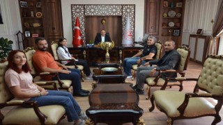 Dünya şampiyonundan Kaymakam Demire ziyaret