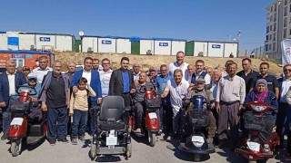 Gurbetçilerden engellilere akülü araç yardımı
