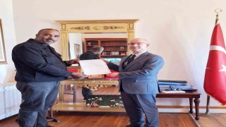 Ayvalıkta Hamdibey Mahallesi Muhtarı Rafet Taşkaraya önemli görev