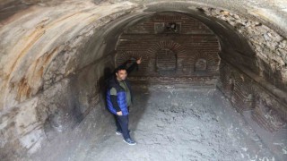 Enkazın kaldırılmasıyla binaların altında ortaya çıkan yapı merak uyandırdı