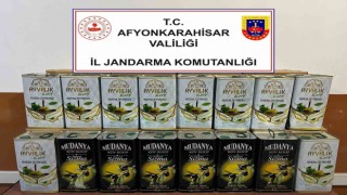 Ürettiği sahte zeytinyağlarını satamadan jandarmaya yakalandı