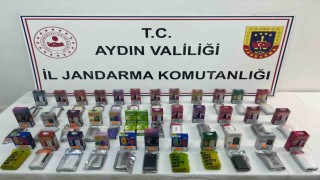 Kuşadasında sigara kaçakçılığı baskını: 2 gözaltı