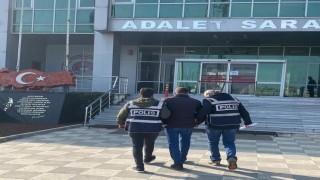 Gönende silahla yağma suçundan aranan şahıs yakalandı