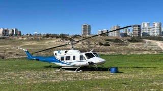 Helikopter, malzeme ve personel ikmalini boş arazide yaptı
