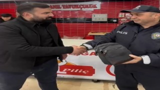 Kayseri polisi, bulduğu yüklü miktarda para dolu çantayı sahibine teslim etti