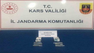 Karsta İranlıların sigara paketine sakladığı uyuşturucu jandarmaya takıldı