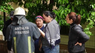 Çamaşır makinesinden çıkan yangın apartman sakinlerini sokağa döktü