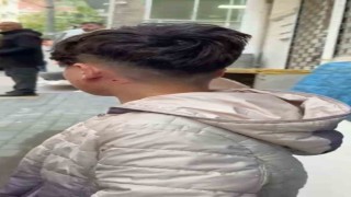 Camı tıklattığı için çocuğu darp etti