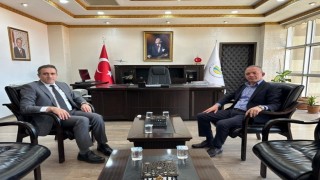 Burhaniyede Mülkiye Başmüfettişi Öner, kaymakam İlyas Memişi ziyaret etti