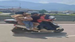 Bursada motosiklete 5 kişi binen aile yürekleri ağza getirdi