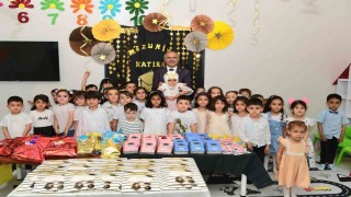 Miniklerin ilk karnesi Başkan Erin elinden