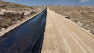 Bozovada 6 mahalleyi birbirine bağlayan yol asfaltlandı