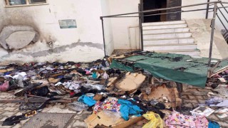 Evinin önündeki tekstil ürünleri tezgahı küle döndü