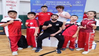 Körfez GB sporcuları madalya kürsüsünde