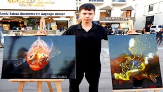 Mavi dünyanın güzelliklerini objektifine taşıdı, Çeşmede sergiledi