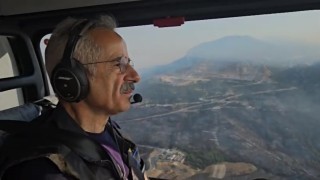 Bakan Uraloğlu, helikopterle yangın bölgesini havadan inceledi