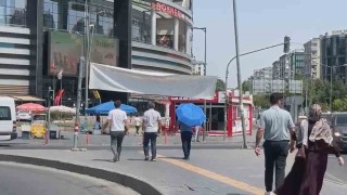 Diyarbakır sıcağında şemsiyeli çözüm