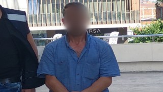Eşinin boğazını sıkma iddiasına adli kontrol