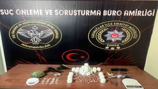 İzmirde uyuşturucu ve silah kaçakçılığı: 2 gözaltı