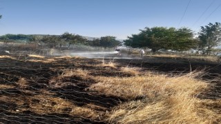 Tuncelide otluk alanda çıkan yangın ekiplerin müdahalesiyle söndürüldü