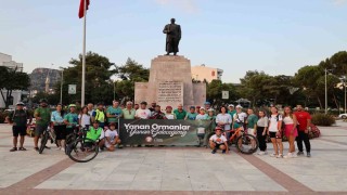 Bisikletçiler orman yangınlarına dikkat çekmek için pedalladı