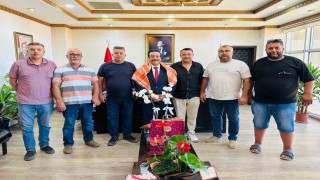 Burhaniye deveciler derneğinden Kaymakam Atillaya ziyaret