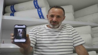 İş yerine giren 2 metrelik yılana kanka diye hitap edip boynuna doladı