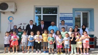 Karacasuda protokol üyeleri Yaz Kuran Kursu öğrencileri ile bir araya geldi